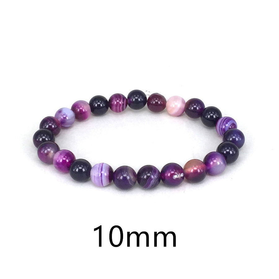 Elegant real amethyst bracelet featuring purple stone beads, perfect for adding a touch of sophistication to any outfit