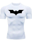  A front view of the stylish Batman compression tee showcasing the iconic Batman emblem in a gym setting.