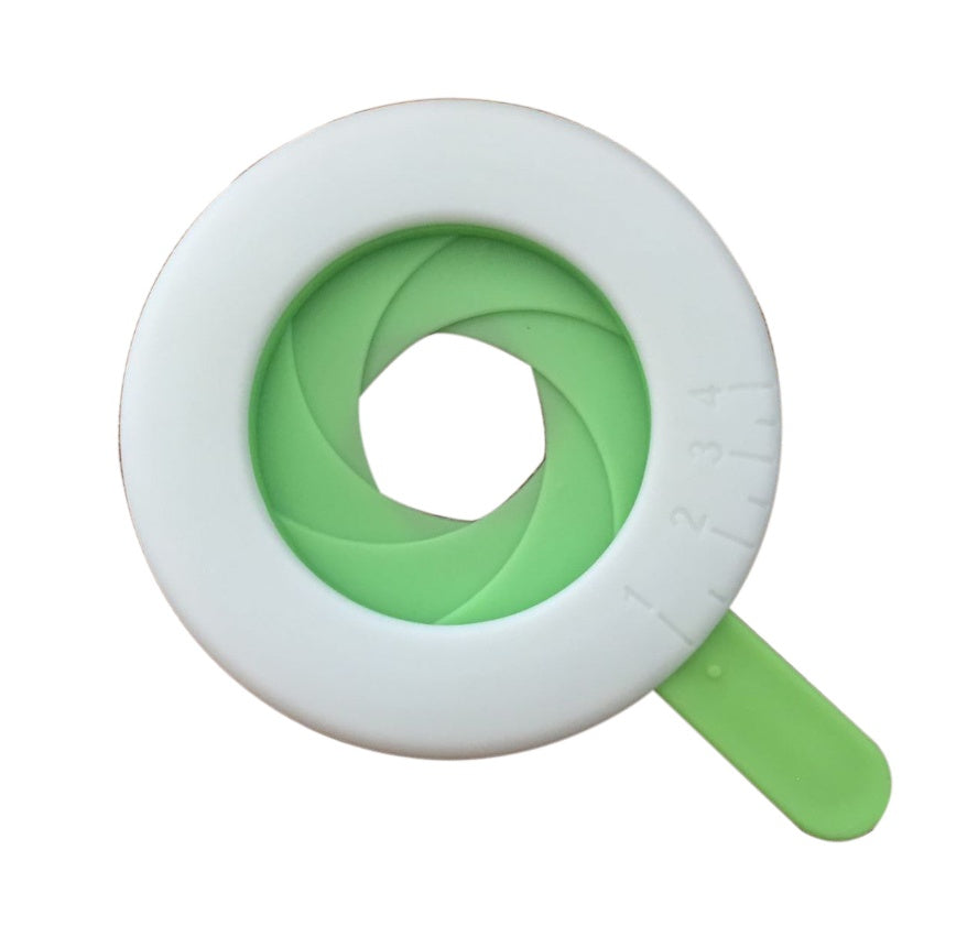 Close-up of a durable plastic spaghetti portion tool used for accurately measuring pasta portions, featuring a compact and easy-to-use design. Ideal as a pasta measuring tool, spaghetti measuring tool, spaghetti measurer, and versatile pasta measurer tool for home kitchens.