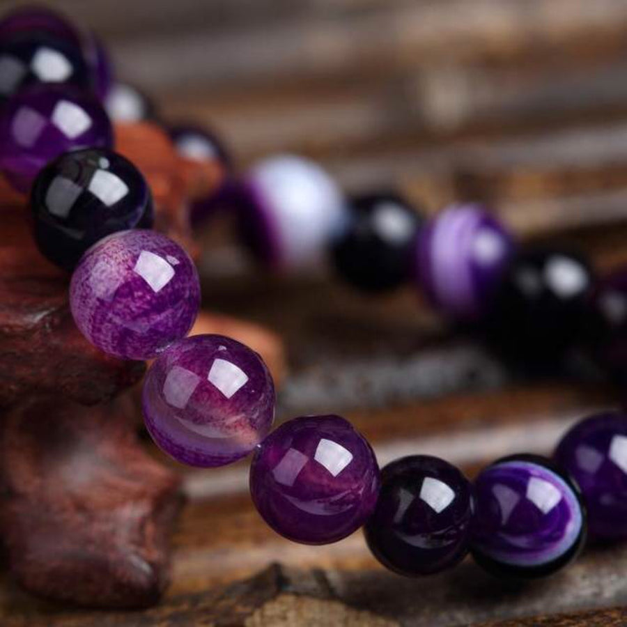 Elegant real amethyst bracelet featuring purple stone beads, perfect for adding a touch of sophistication to any outfit
