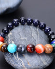 A sustainable and spiritual accessory crafted as a healing crystal chakra bracelet inspired by the universe.