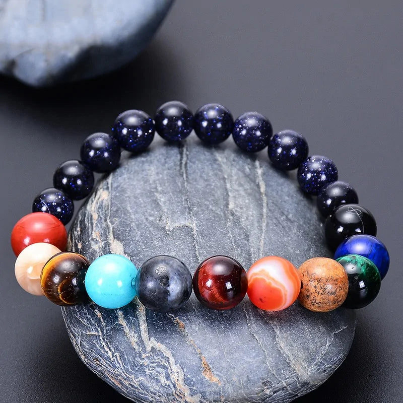 A sustainable and spiritual accessory crafted as a healing crystal chakra bracelet inspired by the universe.