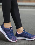 Women's athletic shoes featuring a breathable mesh upper, low wedge heel (1-3CM), EVA sole, and vulcanized construction, designed for comfort and durability in tennis, running, and everyday athletic activities.