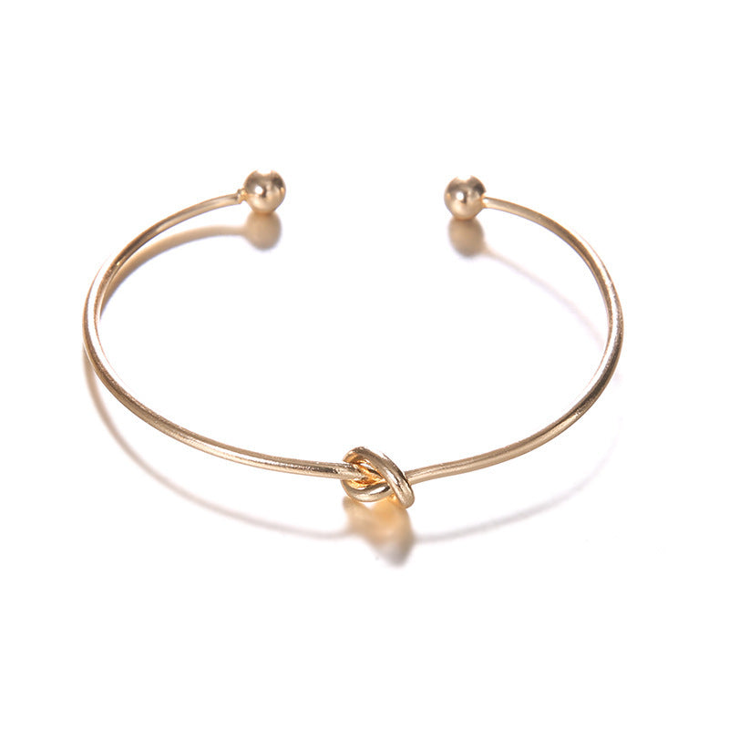 Elegant Women's Arrow Knotted Bracelet made of high-quality alloy with an electroplated finish, perfect for special occasions like weddings, anniversaries, and birthdays.