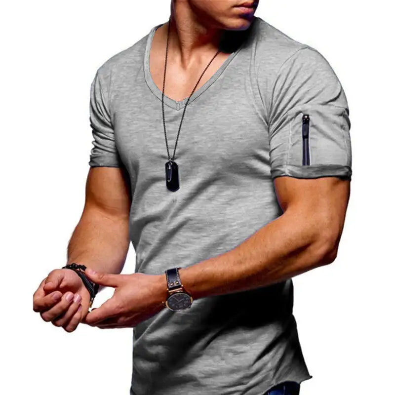 The Men's V-Neck Casual T-Shirt styled with jeans and a blazer for a modern, minimalist look.