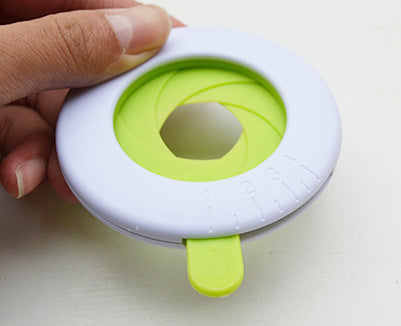 Close-up of a durable plastic spaghetti portion tool used for accurately measuring pasta portions, featuring a compact and easy-to-use design. Ideal as a pasta measuring tool, spaghetti measuring tool, spaghetti measurer, and versatile pasta measurer tool for home kitchens.