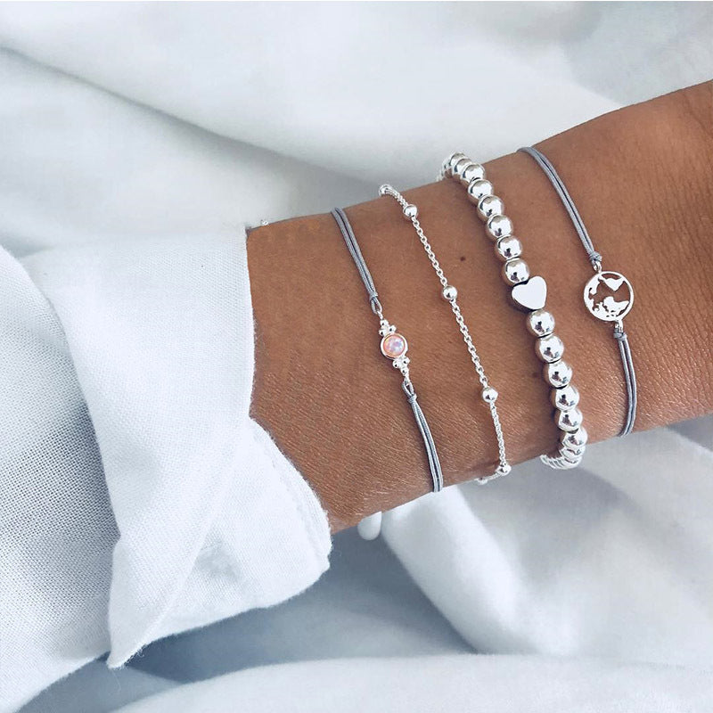 Elegant anklet bracelet featuring a star and moon design, with geometric, love, and flower elements. Includes turtle charm and beaded accents for a unique, boho-inspired look perfect for special occasions like weddings, anniversaries, and birthdays