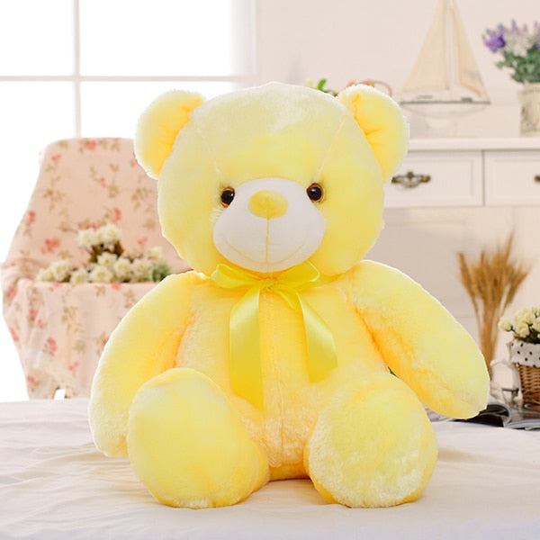 A plush teddy bear that features LED lights, offering a cozy, glowing companion for children at night."