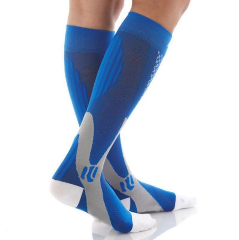 Unisex compression socks made from polyester, nylon, and cotton, designed for improved circulation, reduced swelling, and all-day comfort. Available in multiple sizes for men and women