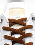 QuickFit Elastic Shoelaces showing off their no-tie feature on sports sneakers for a hassle-free fit.