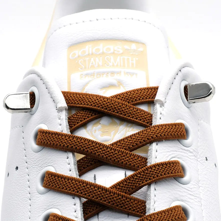 QuickFit Elastic Shoelaces showing off their no-tie feature on sports sneakers for a hassle-free fit.