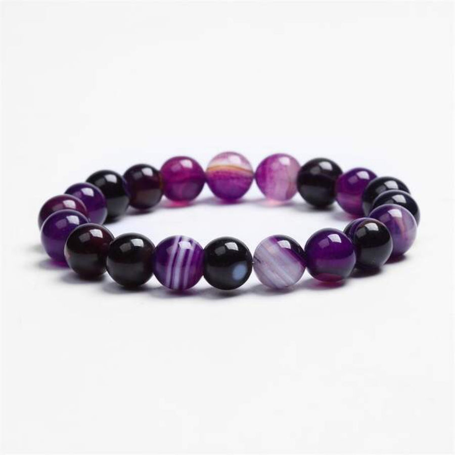 Elegant real amethyst bracelet featuring purple stone beads, perfect for adding a touch of sophistication to any outfit.