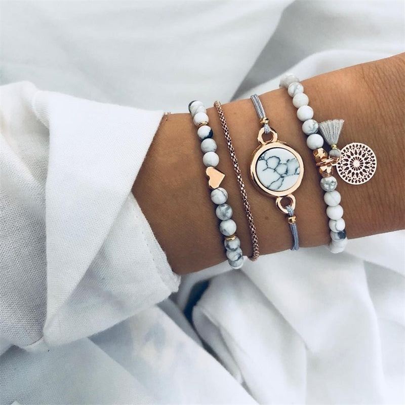 Elegant anklet bracelet featuring a star and moon design, with geometric, love, and flower elements. Includes turtle charm and beaded accents for a unique, boho-inspired look perfect for special occasions like weddings, anniversaries, and birthdays