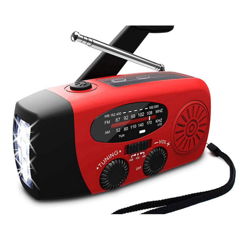Solar hand crank radio with USB charging port, red in color. Features include a Midland Weather Alert Radio, hand crank radio flashlight, and solar charging capabilities, designed for emergency preparedness and outdoor use.
