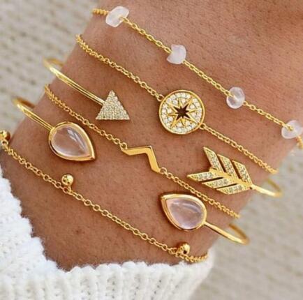 Elegant anklet bracelet featuring a star and moon design, with geometric, love, and flower elements. Includes turtle charm and beaded accents for a unique, boho-inspired look perfect for special occasions like weddings, anniversaries, and birthdays