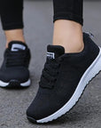 Women's athletic shoes featuring a breathable mesh upper, low wedge heel (1-3CM), EVA sole, and vulcanized construction, designed for comfort and durability in tennis, running, and everyday athletic activities.
