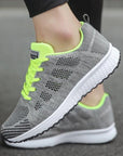 Women's athletic shoes featuring a breathable mesh upper, low wedge heel (1-3CM), EVA sole, and vulcanized construction, designed for comfort and durability in tennis, running, and everyday athletic activities.