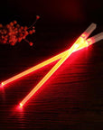 LED chopsticks Lightsaber utensils Novelty dining Geeky gadgets Futuristic tableware Star Wars chopsticks Illuminated dining Sci-fi kitchenware Fun food accessories Glow-in-the-dark chopsticks