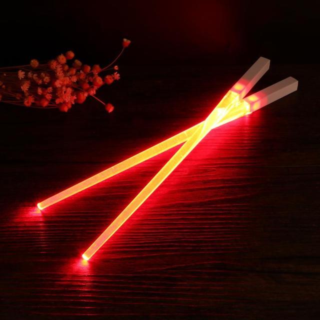 LED chopsticks Lightsaber utensils Novelty dining Geeky gadgets Futuristic tableware Star Wars chopsticks Illuminated dining Sci-fi kitchenware Fun food accessories Glow-in-the-dark chopsticks