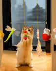 Swinging toys for cats Cat swing toys Hanging cat toys Interactive cat toys Cat play accessories Cat entertainment toys Swinging cat playthings Cat toys for hanging Feline swing toys Suspended toys for cats