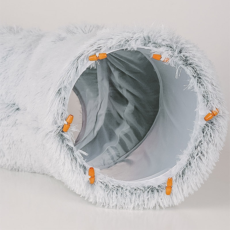 Round tunnel cat bed Dual-purpose cat furniture Cat bed with attached tunnel Cozy hideaway for cats Interactive cat sleeping space Plush round bed for cats Tunnel bed for feline fun Comfy cat nap spot Cat tunnel bed combo Multi-functional cat sleeping accessory