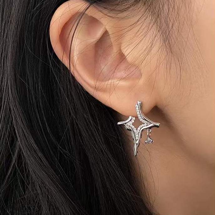 Celestial-inspired earrings Sparkling rhinestone jewelry Asterism pattern earrings Elegant rhinestone accessories Night sky-inspired earrings Glamorous starry earrings Mesmerizing rhinestone studs Eye-catching celestial jewelry Elegant statement earrings Sparkling asterism earrings