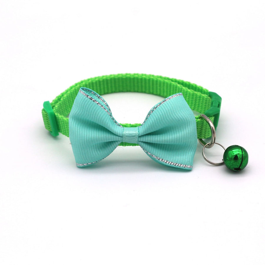 Bow and bell pet collar Fashionable pet accessory Stylish pet collar with bow Cute pet collar with bell Adorable pet collar design High-quality pet collar Durable pet collar for daily wear Pet fashion accessory Pet collar with charm Pet collar with bow and bell