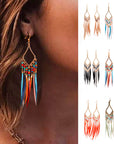 Tassels feather earrings Bohemian feather earrings Fringe feather earrings Statement feather earrings Boho chic earrings Long feather earrings Dangle tassel earrings Trendy feather earrings Fashionable tassel earrings Feather jewelry accessories