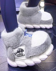 Warm plush lining slippers Cozy fur-lined slippers Fuzzy slip-ons for warmth Soft fleece-lined house slippers Winter indoor slippers with plush lining Comfortable faux fur slippers Fluffy bedroom slippers for cold nights Snug slip-on shoes with plush interior Toasty warm slippers for chilly evenings Comfy fur-trimmed slippers