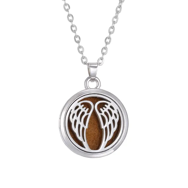 Aromatherapy necklace Tree of life pendant Essential oil diffuser necklace Nature-inspired jewelry Aromatherapy jewelry Stylish wellness accessory Essential oil necklace Tranquility pendant Relaxation jewelry Aromatherapy diffuser pendant