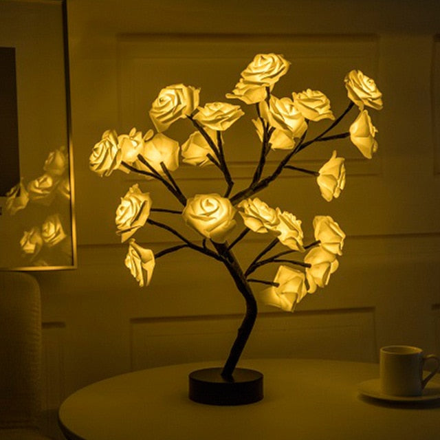 Blossom Bliss Glowing Rose Tree LED rose tree decor Whimsical glowing rose tree Romantic ambiance lighting Lifelike rose blossom lights Enchanting home decor centerpiece LED flower tree decoration Magical garden-inspired decor Soft glow rose tree lights Romantic home lighting accent