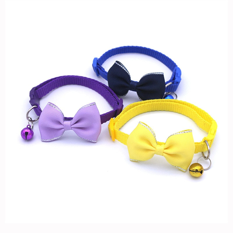 Bow and bell pet collar Fashionable pet accessory Stylish pet collar with bow Cute pet collar with bell Adorable pet collar design High-quality pet collar Durable pet collar for daily wear Pet fashion accessory Pet collar with charm Pet collar with bow and bell