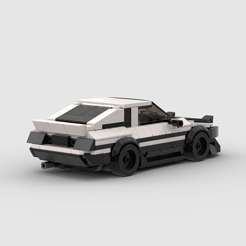 AE86 replica toy car Building blocks drift car Black and white toy car model Iconic AE86 building blocks set Drift car brick toy Collectible car building kit Customizable toy car replica Detailed brick car construction set Toy car for drifting enthusiasts AE86-inspired brick toy