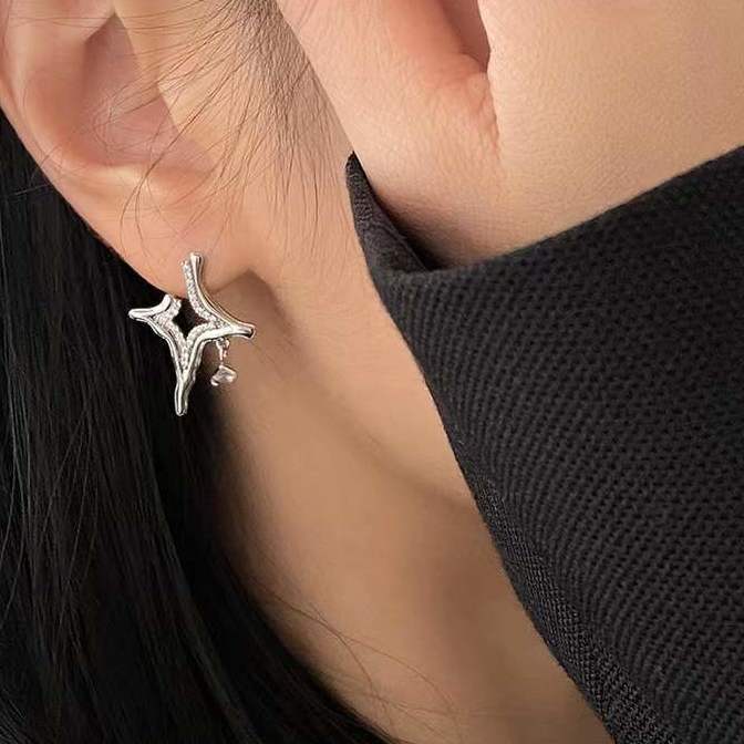 Celestial-inspired earrings Sparkling rhinestone jewelry Asterism pattern earrings Elegant rhinestone accessories Night sky-inspired earrings Glamorous starry earrings Mesmerizing rhinestone studs Eye-catching celestial jewelry Elegant statement earrings Sparkling asterism earrings