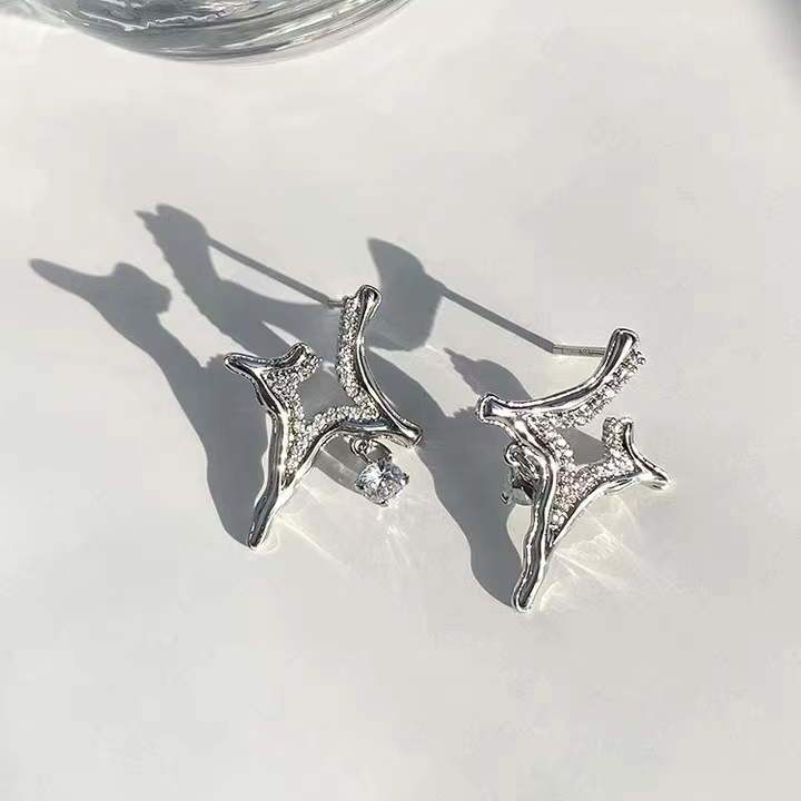 Celestial-inspired earrings Sparkling rhinestone jewelry Asterism pattern earrings Elegant rhinestone accessories Night sky-inspired earrings Glamorous starry earrings Mesmerizing rhinestone studs Eye-catching celestial jewelry Elegant statement earrings Sparkling asterism earrings