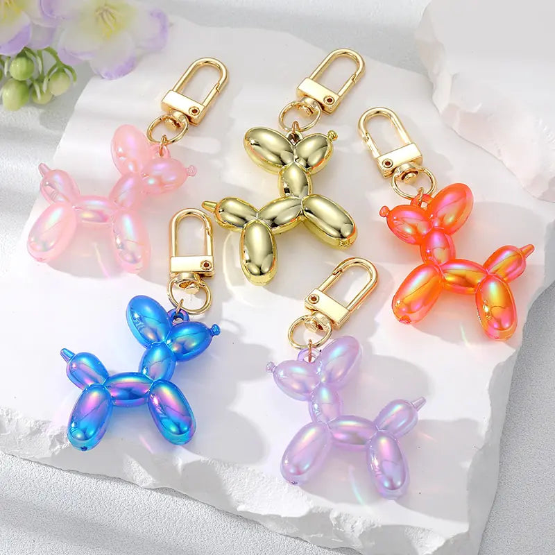 Bling colorful keychains Sparkling key accessories Rhinestone keychain charms Vibrant keychain bling Colorful keyring accessories Shimmering keychain ornaments Eye-catching key adornments Glamorous keychain trinkets Stylish keychain charms Fashionable key bling