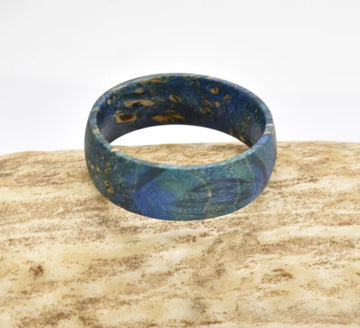 Blue Box Elder Wood Ring Handcrafted wooden ring Unique grain patterns ring Vibrant blue wood ring Nature-inspired ring Rustic elegance jewelry Durable wooden band Comfortable fit ring Artisanal woodwork ring Natural beauty accessory