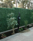 Artificial boxwood green wall Lifelike greenery for indoors UV resistant foliage panels Easy-to-install green wall Maintenance-free greenery Instant charm for any space Versatile artificial green wall Faux boxwood wall panels Indoor/outdoor greenery solution Long-lasting green wall decor