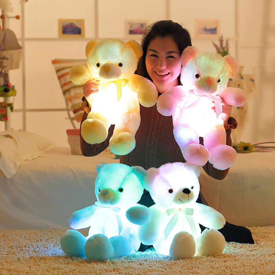 A cuddly teddy bear that glows in the dark, providing comfort and a sense of security for kids at night."