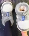 Warm plush lining slippers Cozy fur-lined slippers Fuzzy slip-ons for warmth Soft fleece-lined house slippers Winter indoor slippers with plush lining Comfortable faux fur slippers Fluffy bedroom slippers for cold nights Snug slip-on shoes with plush interior Toasty warm slippers for chilly evenings Comfy fur-trimmed slippers