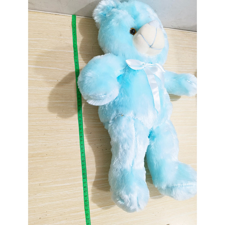 A stuffed animal with LED lighting embedded within, offering both a cuddly companion and a gentle nightlight