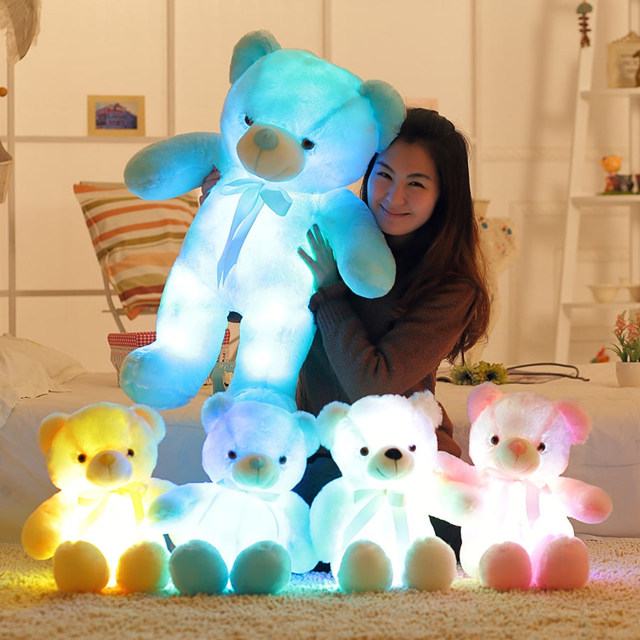 "A soft, cuddly teddy bear featuring LED lights that add a magical glow, perfect for a comforting nightlight