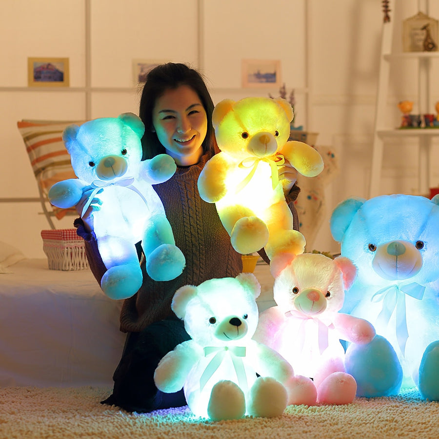 "A plush teddy bear that lights up with gentle LED lights, creating a warm and soothing ambiance."