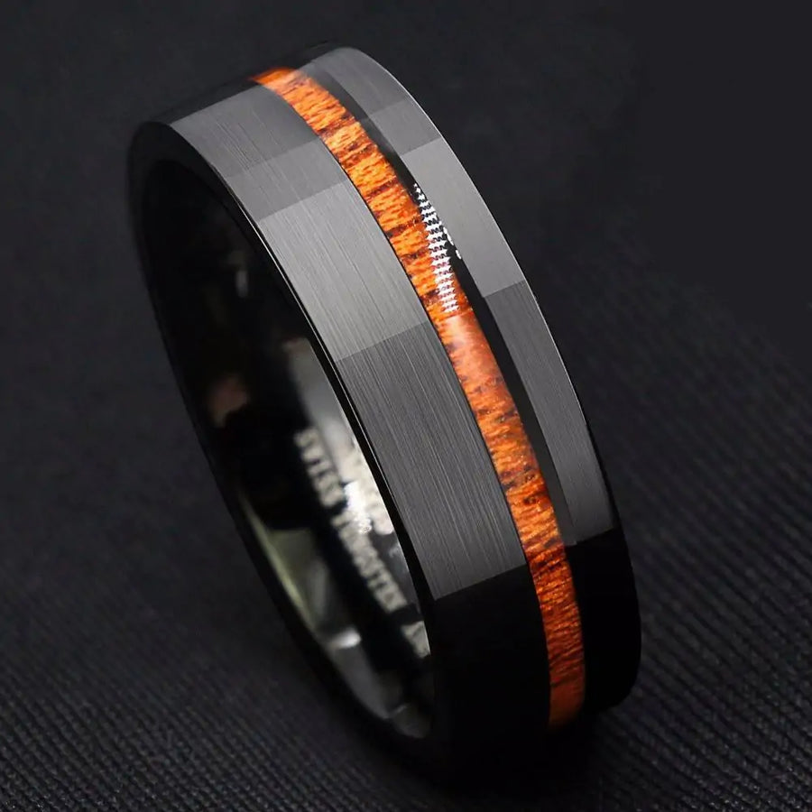 Black tungsten carbide wood ring Brushed finish wedding band Modern men's ring Wood inlay tungsten ring Sleek black wedding band Durable tungsten carbide ring Hypoallergenic men's ring Scratch-resistant wedding band Stylish wood and metal ring Elegant tungsten carbide band Minimalist wood and metal ring featuring a durable black tungsten design and eco-friendly wood inlay