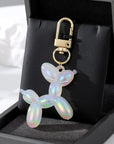 Bling colorful keychains Sparkling key accessories Rhinestone keychain charms Vibrant keychain bling Colorful keyring accessories Shimmering keychain ornaments Eye-catching key adornments Glamorous keychain trinkets Stylish keychain charms Fashionable key bling