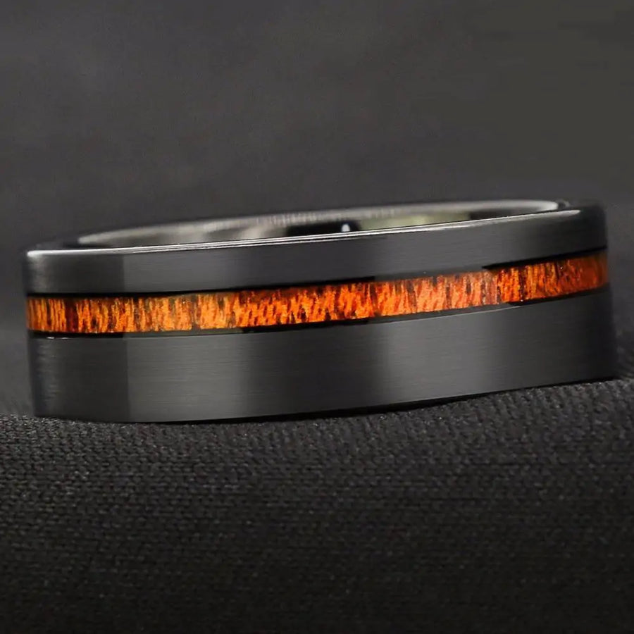 Black tungsten carbide wood ring Brushed finish wedding band Modern men's ring Wood inlay tungsten ring Sleek black wedding band Durable tungsten carbide ring Hypoallergenic men's ring Scratch-resistant wedding band Stylish wood and metal ring Elegant tungsten carbide band  Men's black tungsten wedding band with a nature-inspired wood inlay and modern brushed texture