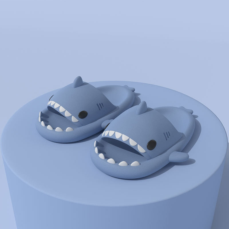  Cool anti-skid shark slippers presented in a festive gift box, a perfect Christmas gift idea for family and friends.

