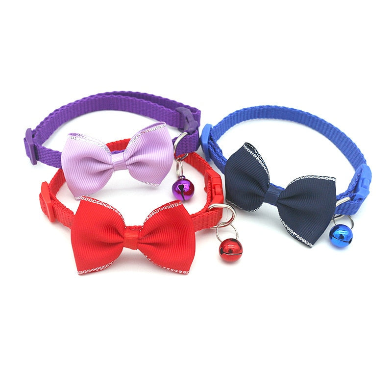 Bow and bell pet collar Fashionable pet accessory Stylish pet collar with bow Cute pet collar with bell Adorable pet collar design High-quality pet collar Durable pet collar for daily wear Pet fashion accessory Pet collar with charm Pet collar with bow and bell