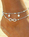 Women double ankle bracelet Double-layer ankle chain for women Layered anklet with dual strands Two-tier ankle bracelet for females Double chain anklet for ladies Women's ankle jewelry with two strands Dual-layer ankle accessory for women Layered ankle chain with double design Feminine ankle bracelet with dual layers Two-strand anklet for stylish women