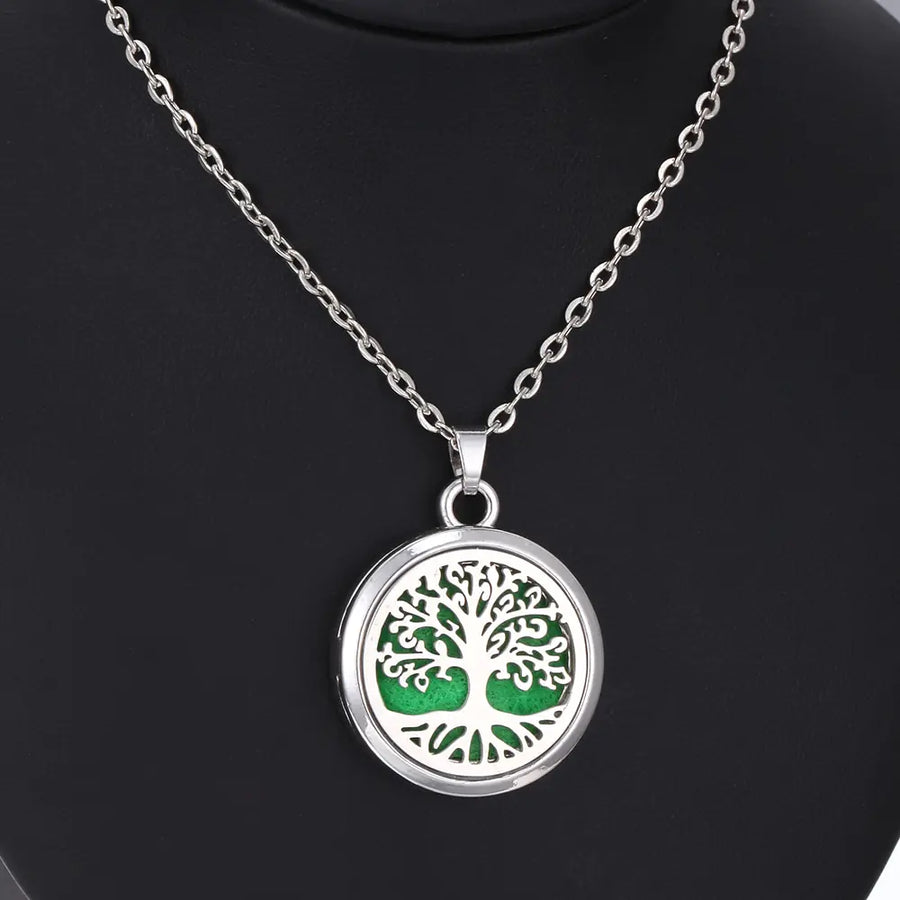 Aromatherapy necklace Tree of life pendant Essential oil diffuser necklace Nature-inspired jewelry Aromatherapy jewelry Stylish wellness accessory Essential oil necklace Tranquility pendant Relaxation jewelry Aromatherapy diffuser pendant